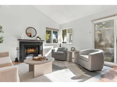 Staged fireplace seating in a home staged by Willow & Fern
